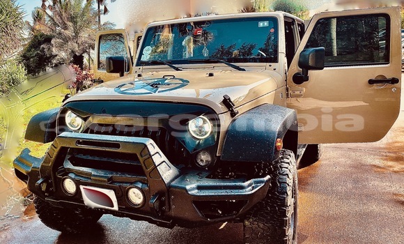 Dieundeu Beess Jeep Wrangler Beige Auto in Sukuta in Brikama Dieundeu Beess Jeep Wrangler Beige Auto in Sukuta in Brikama
